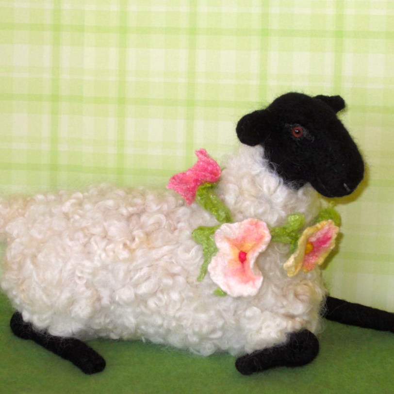 Reclining Suffolk Sheep, bedecked in beautiful blooms