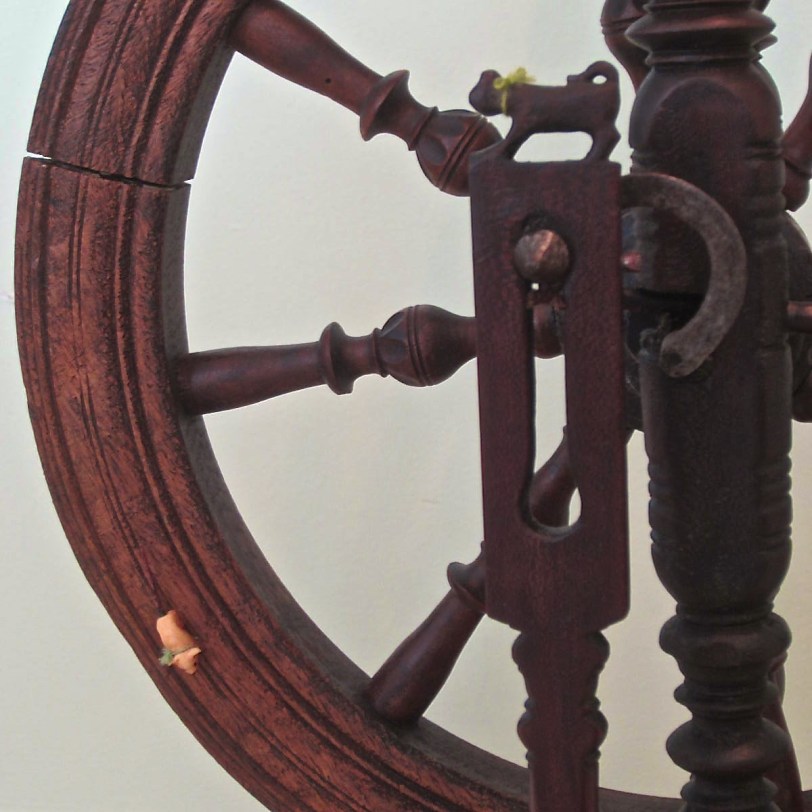 Carved Cat atop the footman.